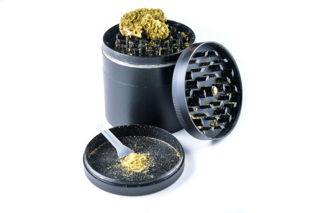 A cannabis flower grinder with a kief catcher.