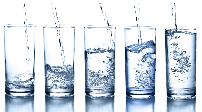 Several glasses of water.